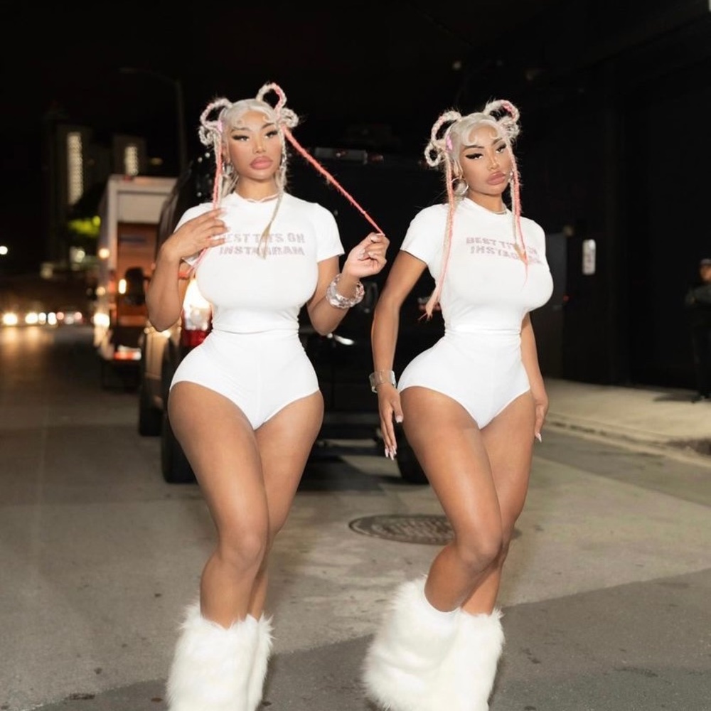 Small white graphic tee. Trending and worn by ice spice and clermont twins.